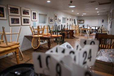 In compliance with state and Austin ordinances, Brentwood Social House cut its hours of operation, closed its dine-in services and asked customers to order and wait outside the coffee shop. March 23, 2020. 