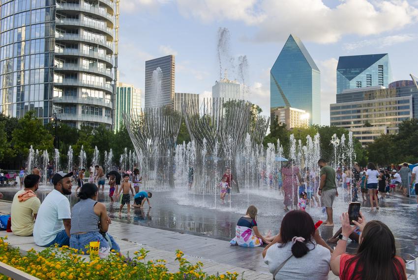 Children play at the Nancy Best Fountain at Klyde Warren Park in downtown Dallas on Sunday, July 27, 2025 in Dallas, Texas.