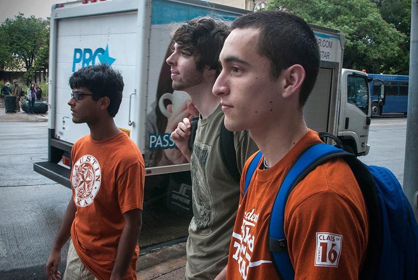 UT freshmen Utkarsh Paul (l), Joesph Zukis (c) and Jorge Mathuta (r) were evacuated from their dorms after receiving a text message from UT warning them of a possible threat. (September 14, 2012)