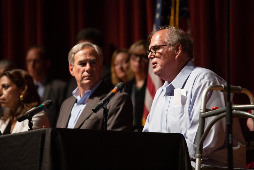 Uvalde Mayor Don McLaughlin speaks with Gov. Greg Abbott at a presser at the Uvalde High School on May 27, 2022. Gov. Abbott addressed the response to the recent school shooting, and emphasized the need to respond appropriately to mental health crises.