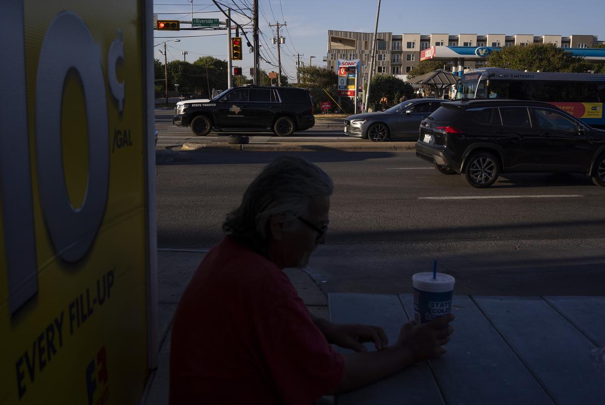 DPS troopers patrol at the corner of Montopolis Dr. and E. Riverside Dr. in southeast Austin on Aug. 7, 2023.