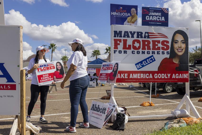 Supporters campaign for Mayra Flores outside a polling location in Weslaco on Election Day, Nov. 8, 2022.