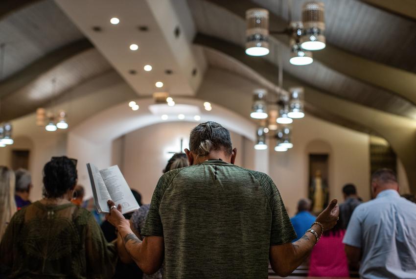 Dozens attend mass at Sacred Heart Catholic Church ahead of President Joe Biden’s arrival in Uvalde on Sunday morning.