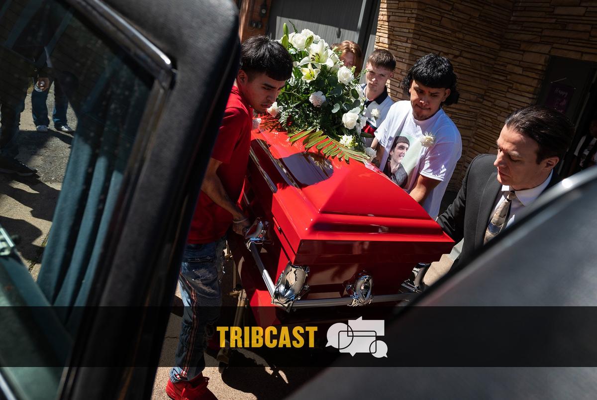 Friends Mario Lozano, 18, left, and Jose Quijada, 18, help to place the casket of Joshua Keith Beasley Jr., inside of a hearse to be transported to a cemetery for burial, on April 1, 2023 outside of Living Word Pentecostal Church in Paris, Texas.
