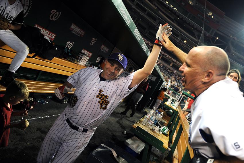 Rep. Steve Scalise, R-La., left, gets encouragement from Rep Kevin Brady, R-Texas, at the annual Congressional Baseball, won by the Republicans, July 17, 2008.