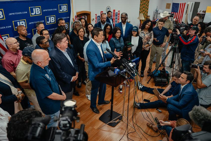Flanked by Illinois Gov. JB Pritzker and members of the Texas House Democratic Caucus, state Rep. and caucus chair Gene Wu speaks at a press conference at the DuPage County Democratic Party headquarters in Carol Stream, Ill., on Sunday, Aug. 3, 2025.