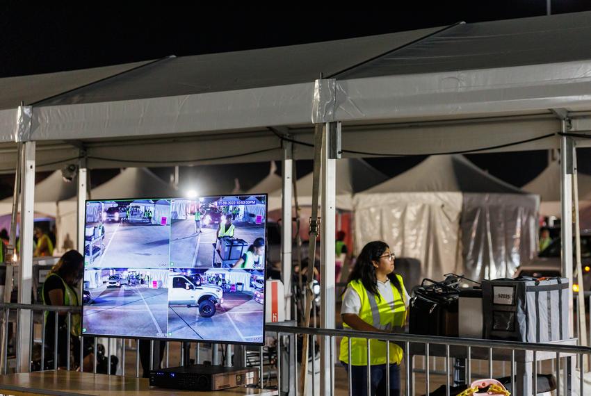 Ballots and scanning machines arrive at central counting after polls close in Houston, Tuesday Nov 8, 2022. (Michael Stravato for the Texas Tribune)