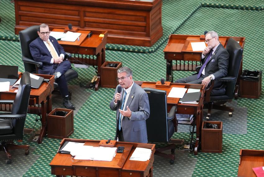 State Sen. Charles Perry, R-Lubbock, sponsor of SB5 regulating tHC products, speaks on the floor of the Senate duri`ng the session on Wednesday, July 30, 2025.  Listening are Sen. Pete Flores R-Floresville l, and Sen Kevin Sparks, R-Midland.