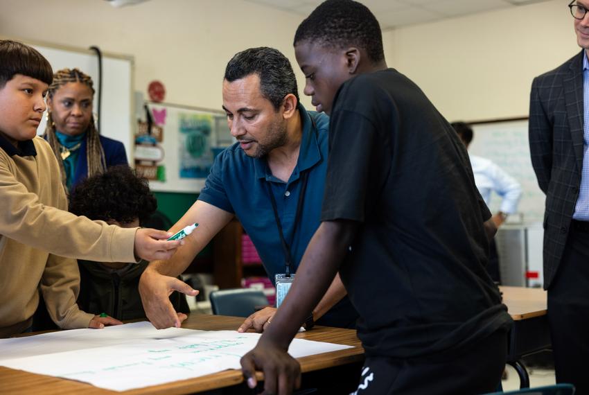 English teacher Nady Khalil works with students during class in Fort Worth ISD’s William James Middle School on Aug. 28, 2025.