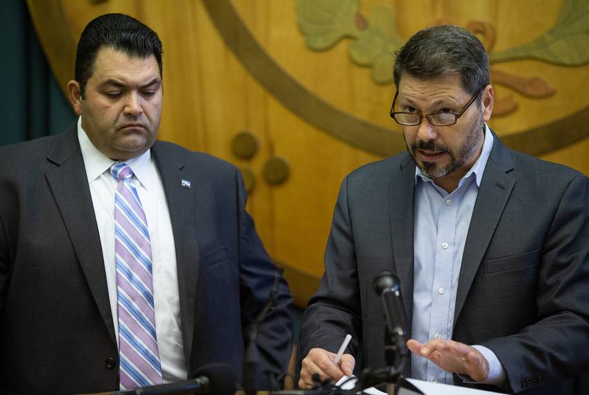 Noel Candelaria, president of the Texas State Teachers Association, and Louis Malfaro, president of the Texas chapter of the American Federation of Teachers, at a press conference at the Capitol on August 30, 2018.