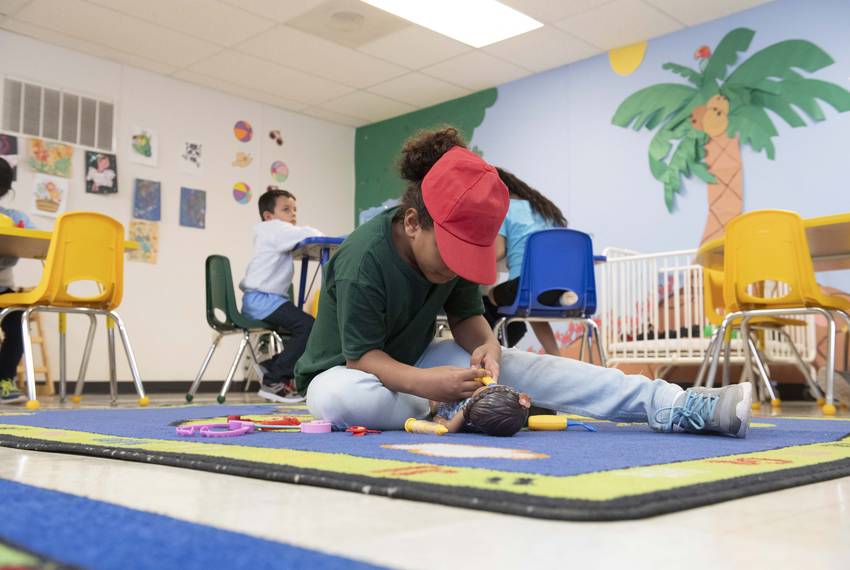 Migrant children from Central American play and attend school classes during the day at the U.S. Immigration and Customs Enforcement's South Texas Family Residential Facility's outside Dilley