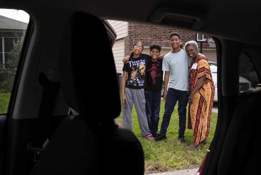 From left: Arihanna Battle, 13, Amare Battle, 11, Daequan Battle, 14, and Gloria Adams, 74, stand in front of their car outside their home in San Antonio on June 14, 2023. Gloria Adams, Intake Coordinator with Texas Grandparents Raising Grandchildren, is the primary caretaker of her five grandchildren. Due to the value of her Adams’ car being too high, even after a recent improvement in House Bill 1287, Adams and her family are not eligible for Supplemental Nutrition Assistance Program (SNAP) benefits including food stamps starting Sept. 1. “If I could qualify, then I would be able to not have to live from from paycheck to paycheck,” Adams said. “What we're doing for our grandchildren is out of our heart, but we need the help to be able to continue to help them.”