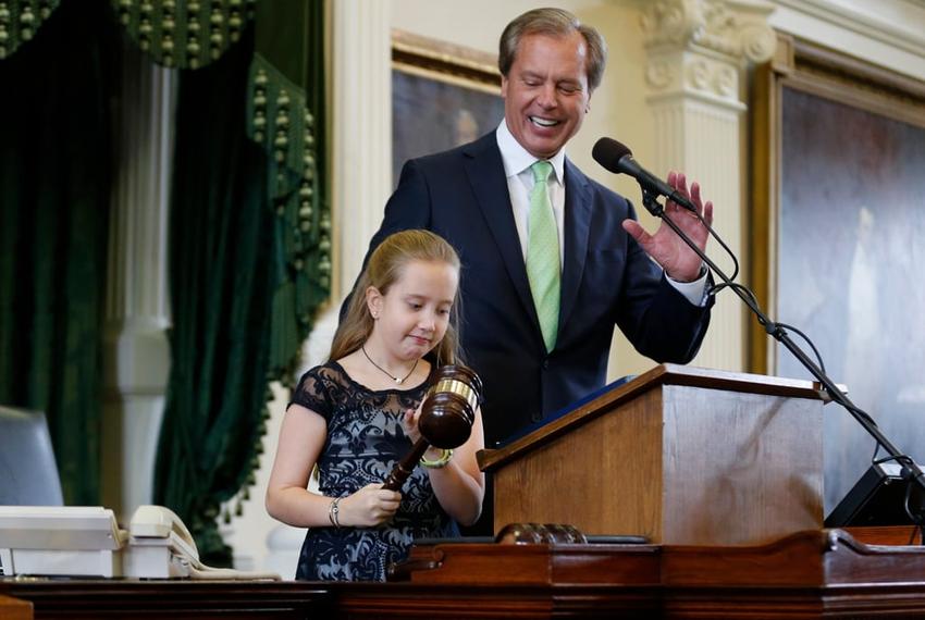 Outgoing Lt. Gov. David Dewhurst and his daughter, Carolyn, on the first day of the 84th Legislative Session.