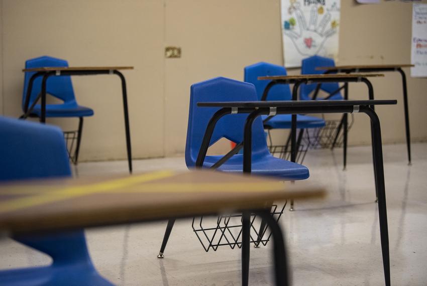 Desks are seated six feet away from each other at Premont Collegiate High School on Aug. 4, 2020 in Premont. Some desks, marked with yellow Xs, were used as placeholders to maintain a socially safe distance.