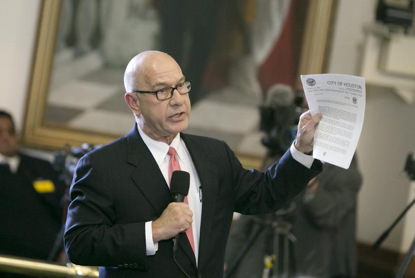 Sen. John Whitmire D-Houston holds up a letter from the city of Houston chief of police as he ask Sen. Charles Perry R-Lubbock questions regarding SB4 on February 7, 2017