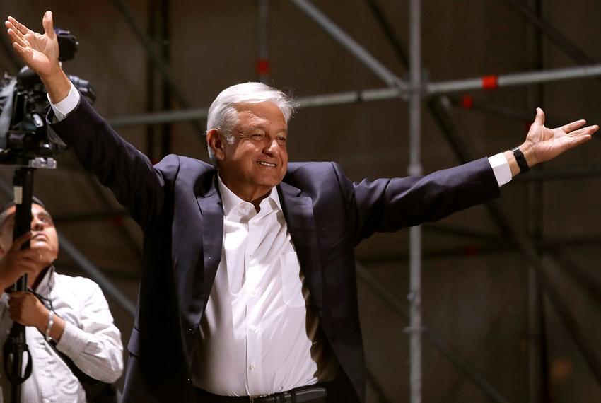 Newly elected Mexican President Andrés Manuel López Obrador gestures to supporters in Mexico City on July 1, 2018.