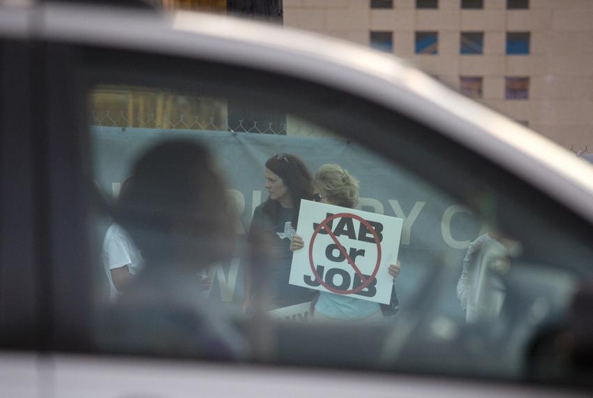 Protesters ralled against Houston Methodist Hospital's COVID-19 vaccine mandate outside the Baytown facility on June 7, 2021. Several employees who chose not to inoculate themselves worked their last shift Monday and will face job termination, a policy criticized by the protesters as unfair and unauthorized.