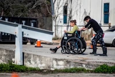 Pam Reynolds, left, and her neighbor Amy live at the state-sanctioned homeless camping site in Austin.