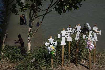 Memorial crosses left on the banks of the Rio Grande in honor of those who lost their lives trying to cross to the U.S. this year in Matamoros, Mexico on Sunday, Oct. 13, 2019. 
Verónica G. Cárdenas for The Texas Tribune