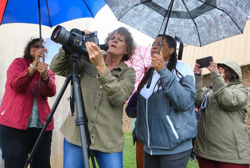 Sharon Wilson, an optical gas thermographer with Earthworks, shows images of gas emissions to EPA region six administrator Earthea Nance at a gas compressor in Arlington on March 16, 2023.