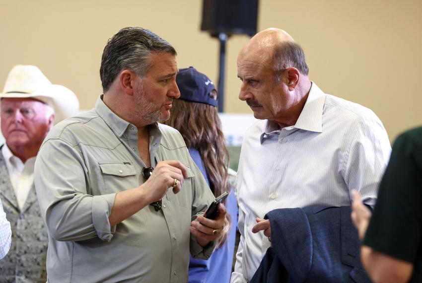 U.S. Sen. Ted Cruz speaks with television personality Dr. Phil McGraw  on the day of a roundtable discussion with first responders and local officials along with with President Donald Trump and first lady Melania Trump after catastrophic floods, at the Hill Country Youth Center in Kerrville on July 11, 2025.