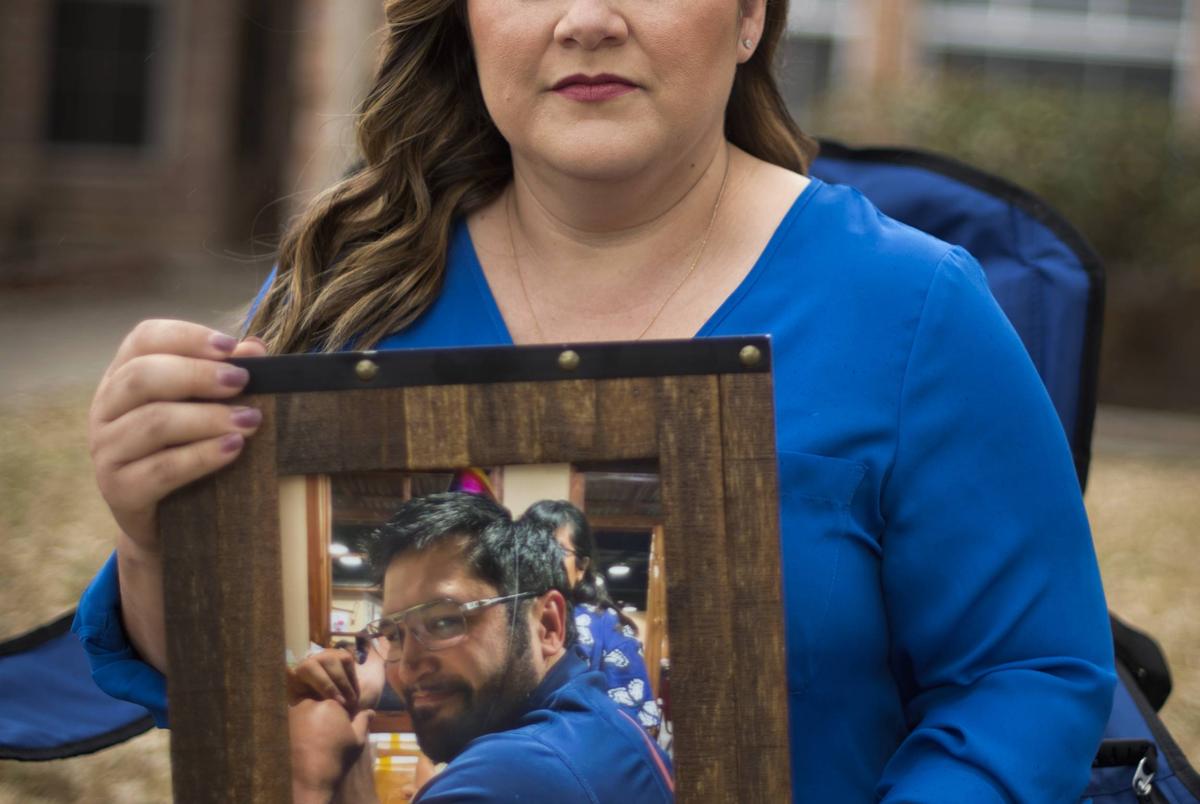 Valerie Villegas with a portrait of her late husband Robert Villegas at her home in Portland.  Robert died from COVID-19 on January 25, 2021.