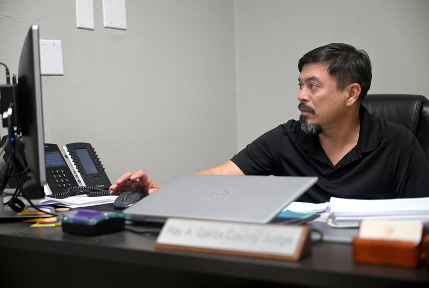 While construction on the county courthouse is being completed, Aransas County Judge Ray A. Garza has his office on a strip mall a few miles from the county building.