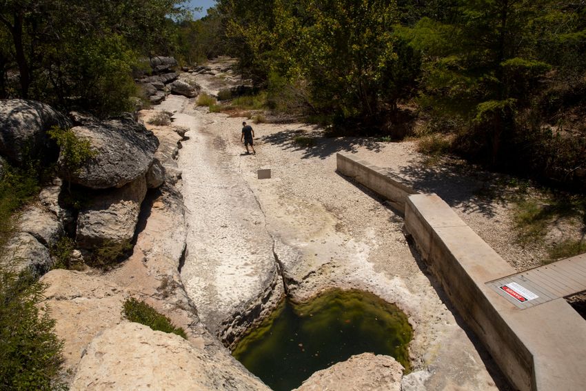 David Baker, founder and director of the Wimberley Watershed Association, said he's never seen the water level so low in Jacob's Well. Photographed on Thursday, August 10, 2023.