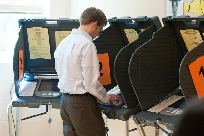 A voter casts a ballot in Travis County on November 2, 2010.