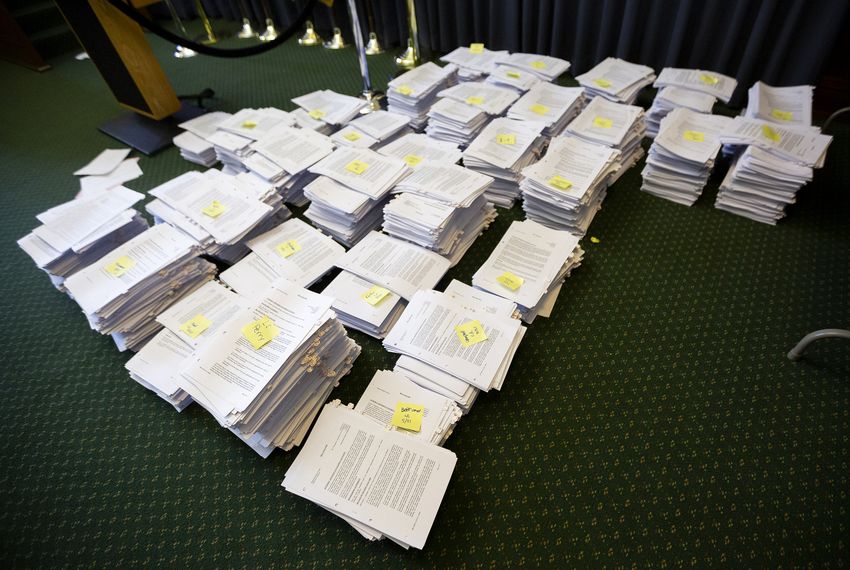 The Sergeant-At-Arms' team prepares bills, mostly House bills, marked on the calendar for the next day on May 21, 2019.