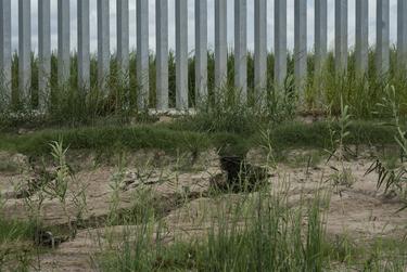 A close-up of erosion at the base of the privately-funded border wall in Mission.