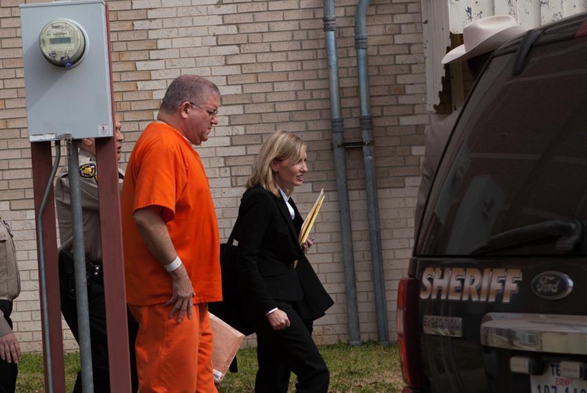 Bernhardt "Bernie" Tiede exits the Panola County Court building with his attorney Jodi Cole after his hearing on Feb. 5, 2014 in Carthage. His attorney filed new evidence that could affect his punishment term. He has been serving time since August of 1997 for the murder of Marjorie Nugent.