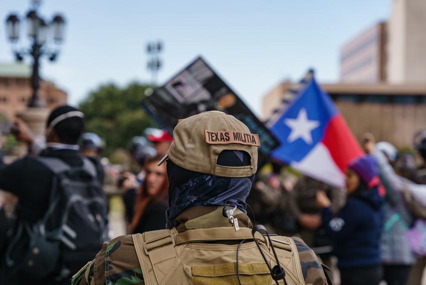 A group of armed protesters gathered for a  demonstration at the Capitol's north entrance on Jan. 12, 2021.