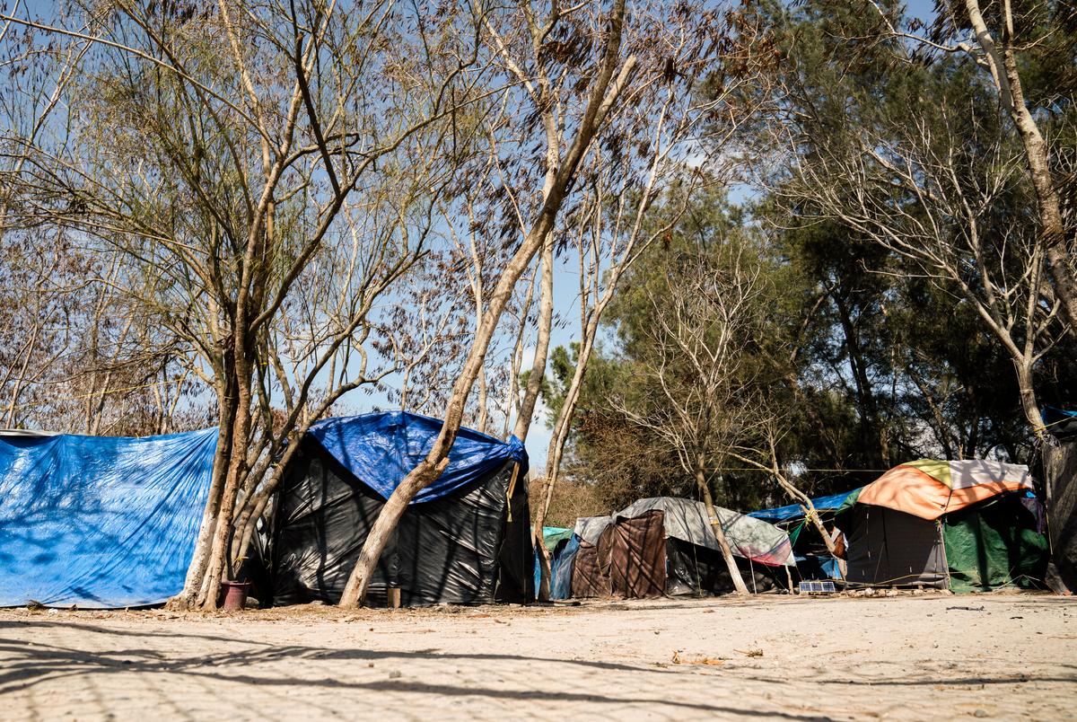 The closed-down migrant camp is seen in Matamoros, Mexico on Feb. 24, 2021. Approximately 800 asylum seekers in the camp were restricted from exiting to prevent others that live in the city to go in and skip the line in being processed into the U.S.