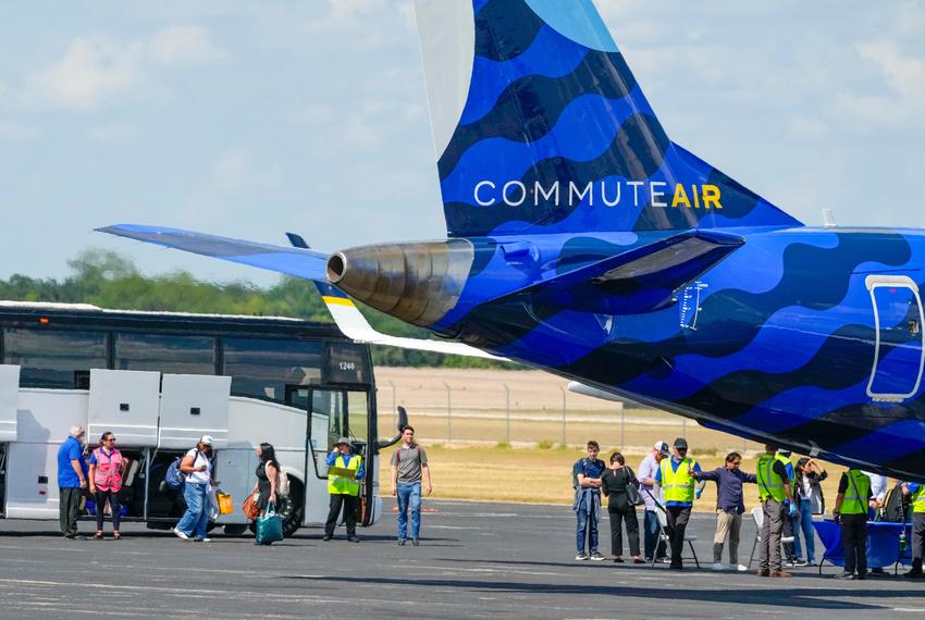 Texas House Democrats go through security screening at Signature Aviation in Austin prior to boarding a flight to Chicago on a quorum break attempt on Aug. 3, 2025.