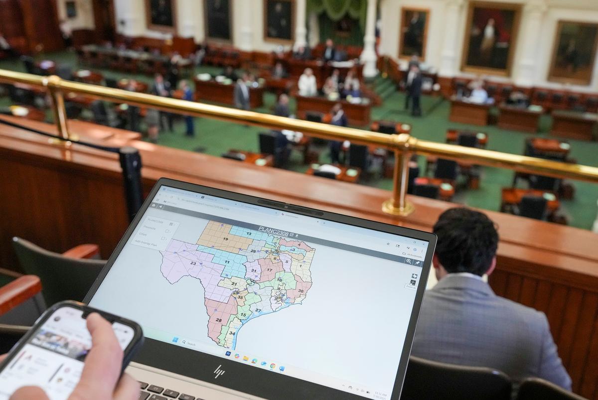 A newly released redistricting map of Texas is visible on a laptop during a Senate session on Wednesday, July 30, 2025.